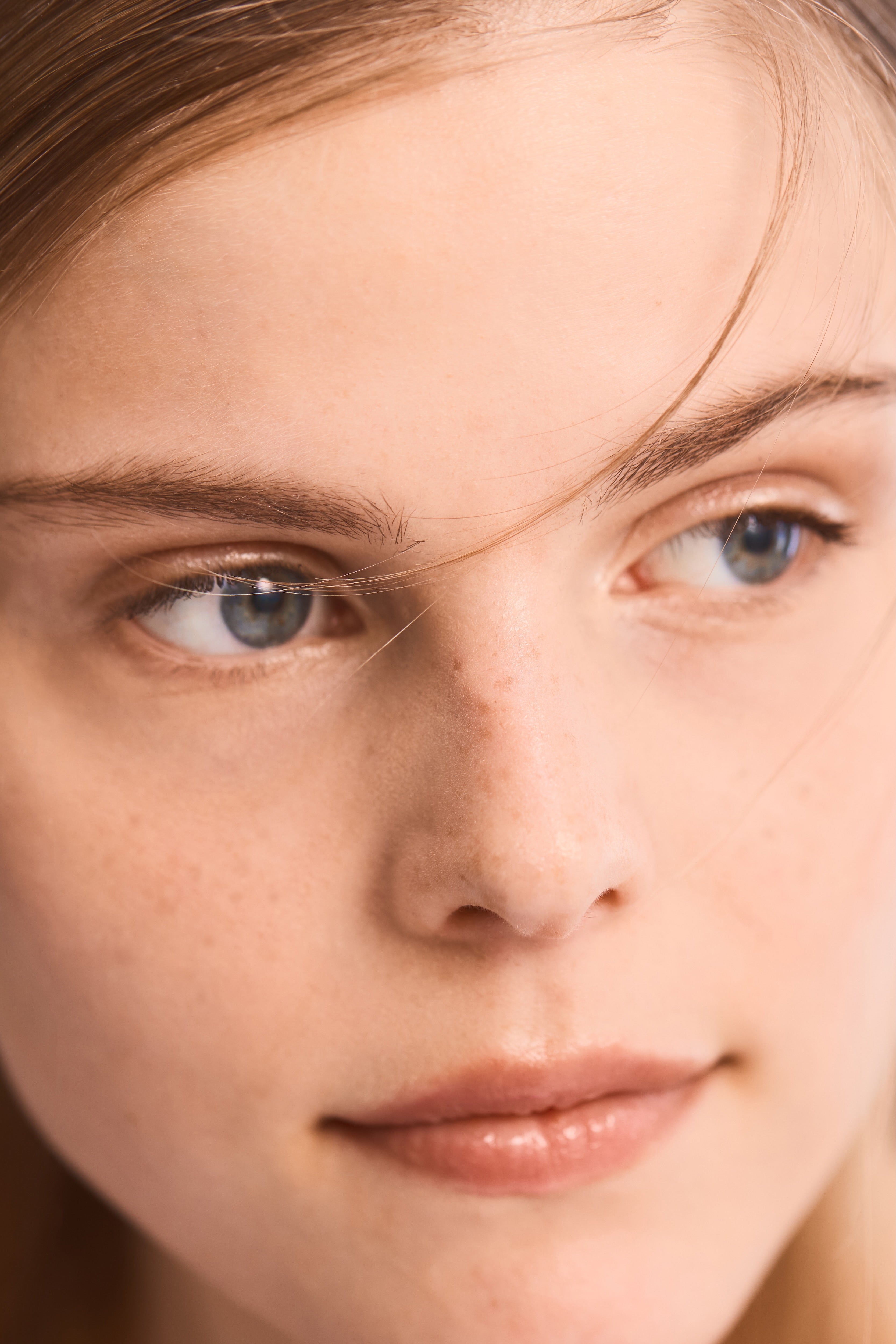 Close-up of a person's face with a focus on the eyes and nose.